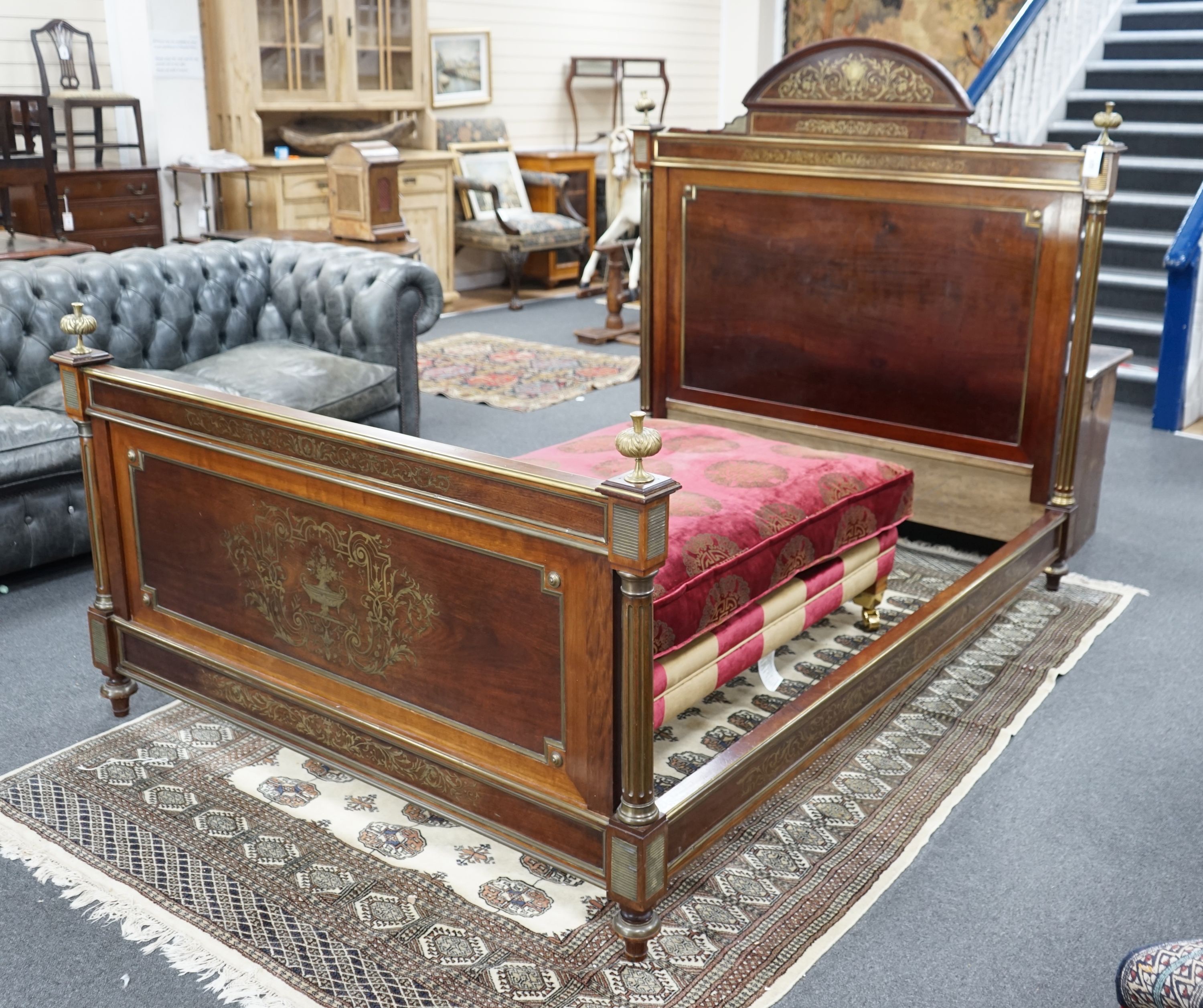 A Louis XVI style brass inlaid mahogany double bed frame, width 143cm, length 204cm